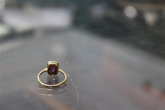 A 1920s/1930s 18ct gold and platinum ruby and diamond tablet ring, size M.